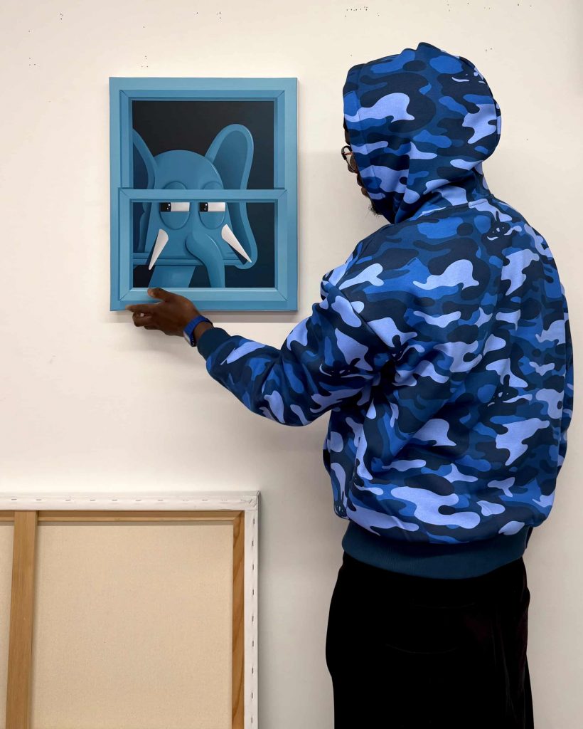 L'artiste toulousain et son personnage "Sama" ©Karl N'da Adopo